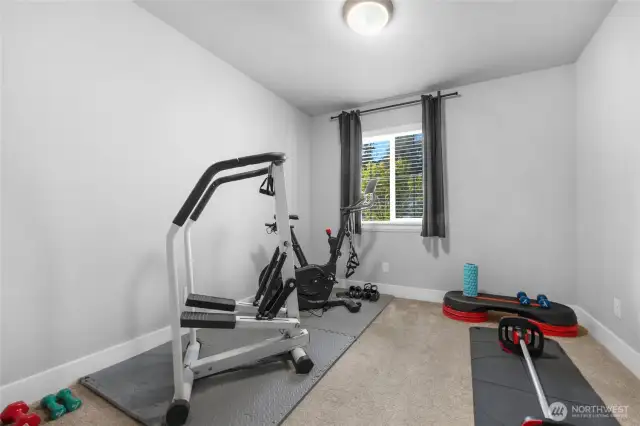 Upper level bedroom being used as a workout room, very spacious