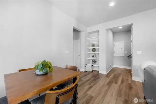 Alternate view of lower level living area, currently set up with an eating table-multi gen possibilities in this area