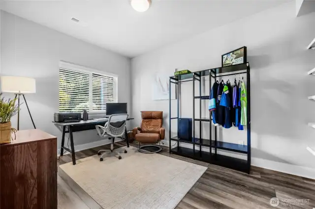 Lower level bedroom with greenbelt view