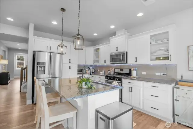 This fantastic kitchen is the heart of the home, just off of the open concept great room and large eating nook