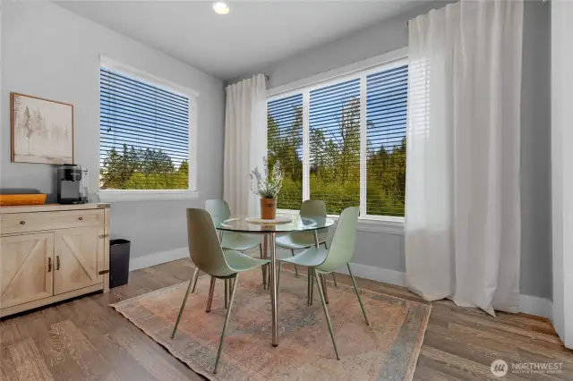 Large eating nook-to get a good guage on its size, the seller has used the large dining room table that seats 8 in this space!