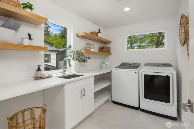 Dedicated laundry room with storage space
