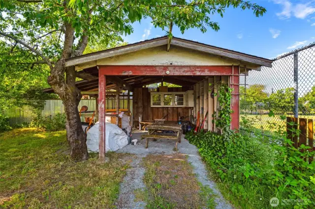 Besides the front garage there is a rear carport.