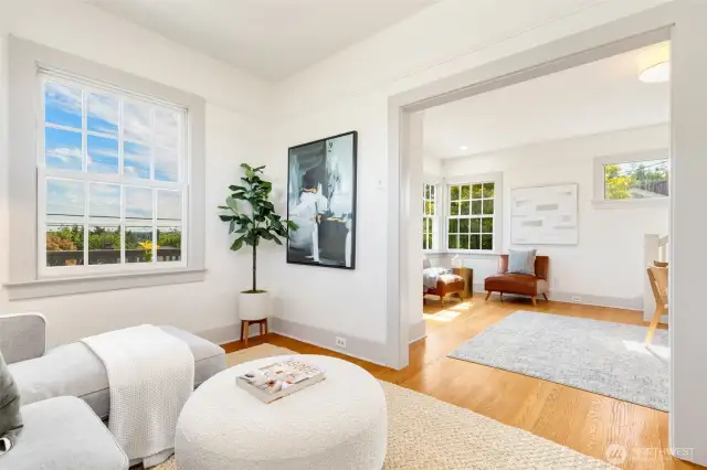 Adjacent to the front room is an additional media/den area which expands living area.