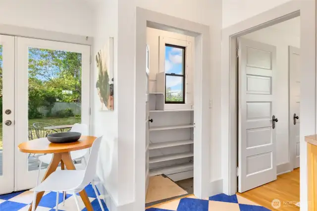 Door to the left takes you to the rear yard deck. Middle door to the unfinished basement. Right door to the main floor bedroom.
