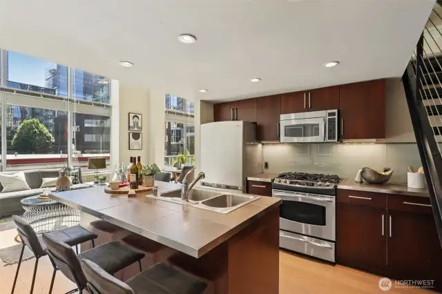 Gormet Kitchen with Stainless Steel Appliances and Custom Cabinets