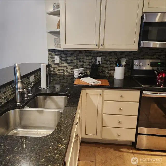 Double stainless kitchen sinks.