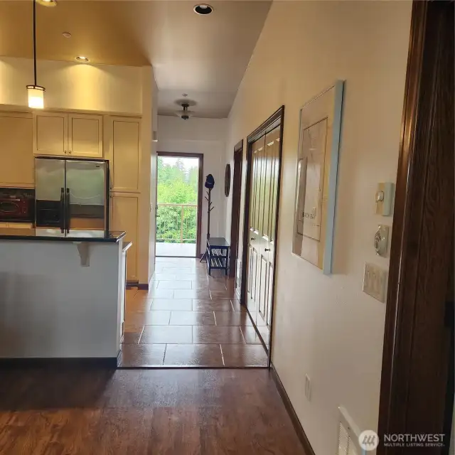 From living room towards the entry through the hallway.