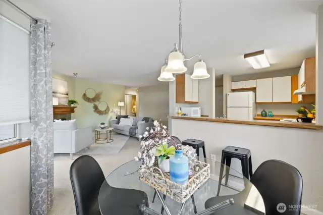 Dining area looking towards living room and kitchen
