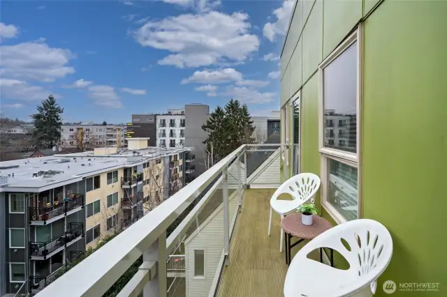 spacious deck on the quiet, cool side of the building