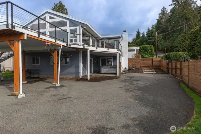 2 driveways with ample space for cars, RV or other toys.