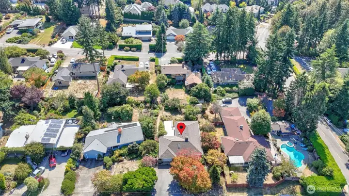 Aerial look at the home’s prime location with natural privacy.