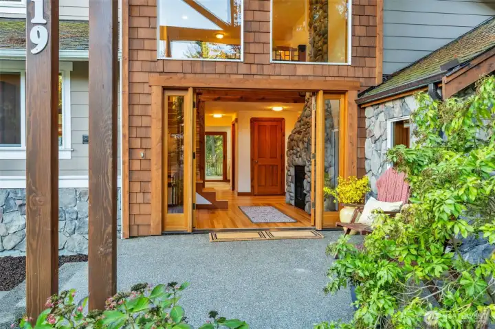 Double doors and a covered deck greet you and your guests!