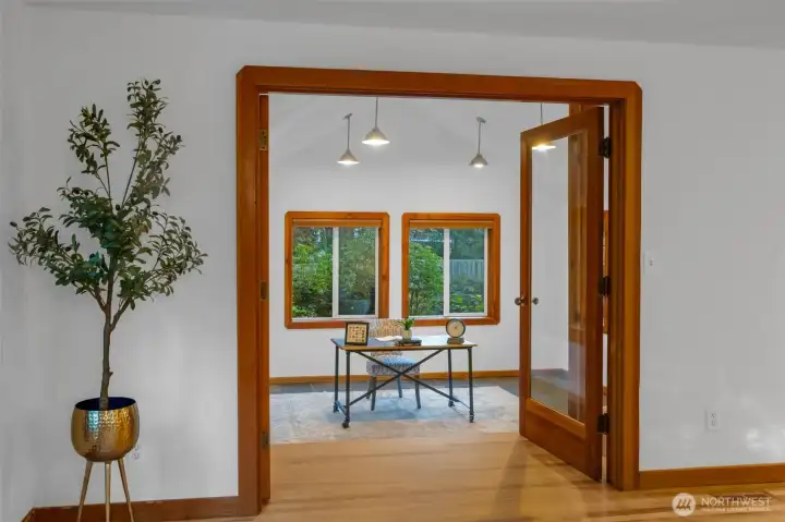 View from dining area side into the multi-purpose extra room.