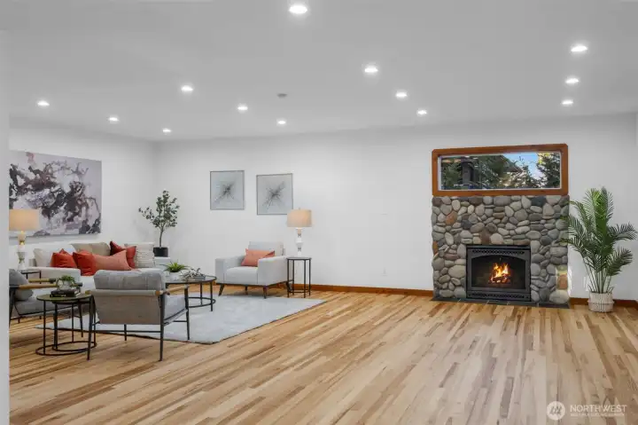 So cozy and open to the back garden, kitchen - could be a second dining room, oversized living room, play area - options are endless!