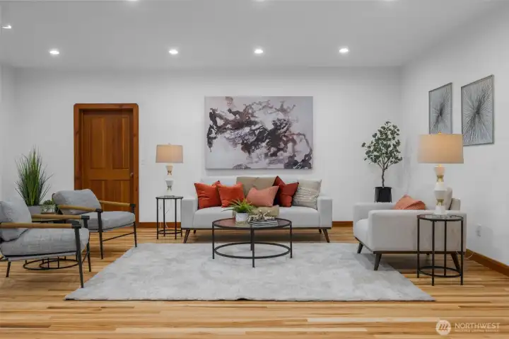 Great room with door that leads to the laundry room