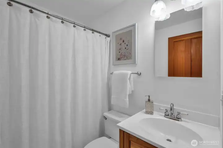 Shared full sized bathroom between 2 upper bedrooms