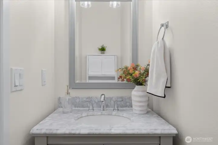 Thoughtfully designed guest bath for everyday convenience.