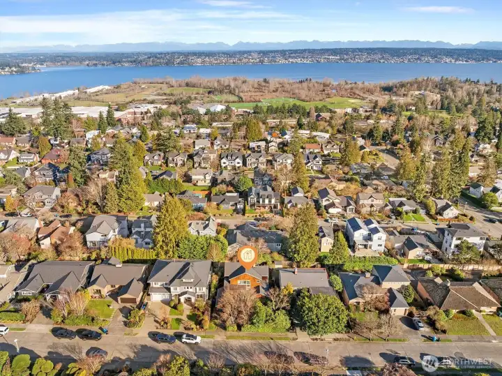 Aerial photo looking east. You can see Lake Washington and Magnuson Park from this photo (BEST PARK IN SEATTLE, THEY ALSO HAVE THE BEST DOG PARK AT MAGNUSON PARK). Sought after View Ridge location. Only minutes to Childrens Hospital, UW, downtown, Amazon and 520. Also the #1 most sought after school cluster. And underground utilities!!!