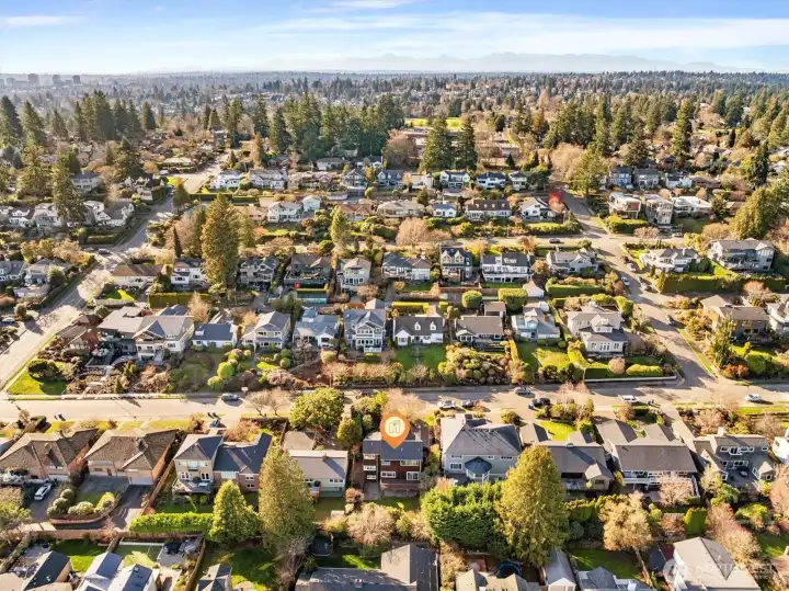 Aerial photo looking west. Sought after View Ridge location. Only minutes to Childrens Hospital, UW, downtown, Amazon and 520. Also the #1 most sought after school cluster. And underground utilities!!!