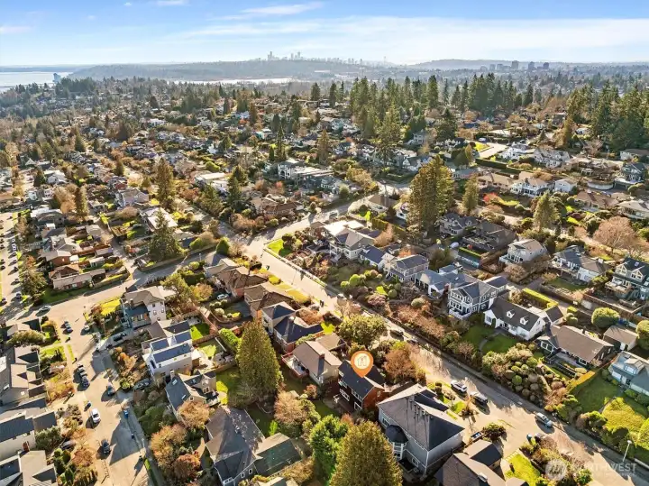 Aerial photo looking east. You can see Lake Washington and downtown Seattle from this photo. Sought after View Ridge location. Only minutes to Childrens Hospital, UW, downtown, Amazon and 520. Also the #1 most sought after school cluster. And underground utilities!!!