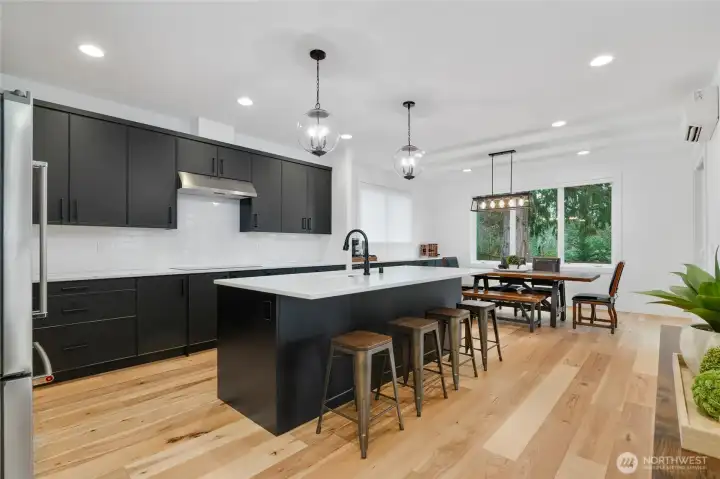 Kitchen opens to dining room