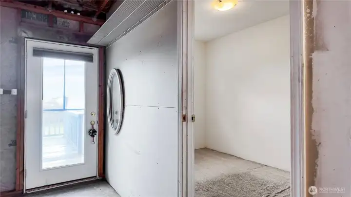 Additional bonus room with natural light, updated flooring, and simple layout.
