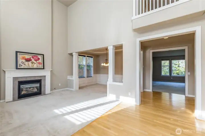 Entry and living room with soaring 2-story ceiling