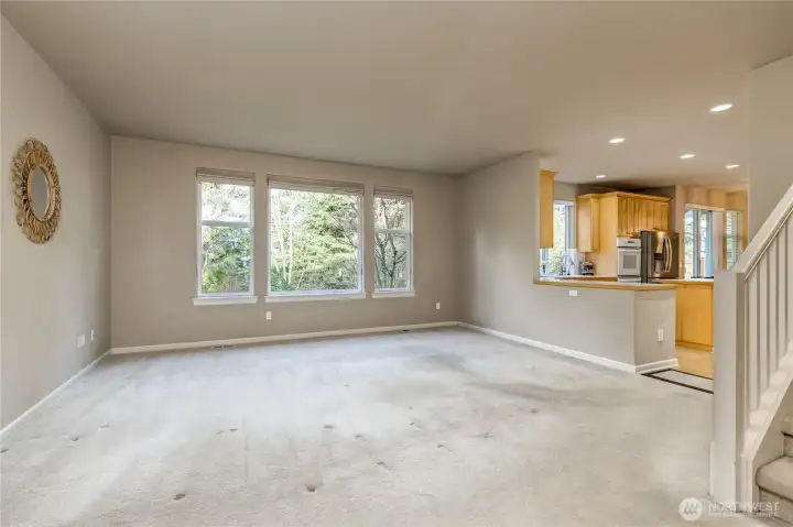 Spacious family room features excellent view of the beautiful back yard