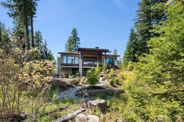 Photos, plans and elevations are from a similar home built by WoodRidge Custom Homes.  Photos, floorplans and renderings are for illustration purposes. Actual fit and finish will vary and may be customized by WoodRidge or the Buyer.  The photos may not accurately represent the actual condition of the homesite, or the home as constructed and may also contain options and upgrades which are not included in the sale.  Any stated dimensions and square footages are estimated.