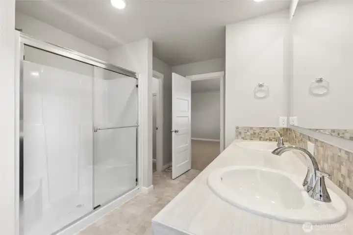 **Photos are of the same home in another community. Features, specs and finishes will vary** This is a presale home.