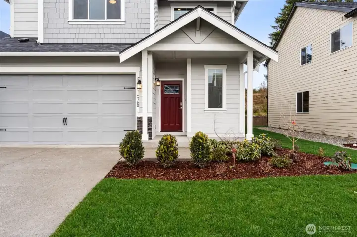 **Photos are of the same home in another community. Features, specs and finishes will vary** This is a presale home.