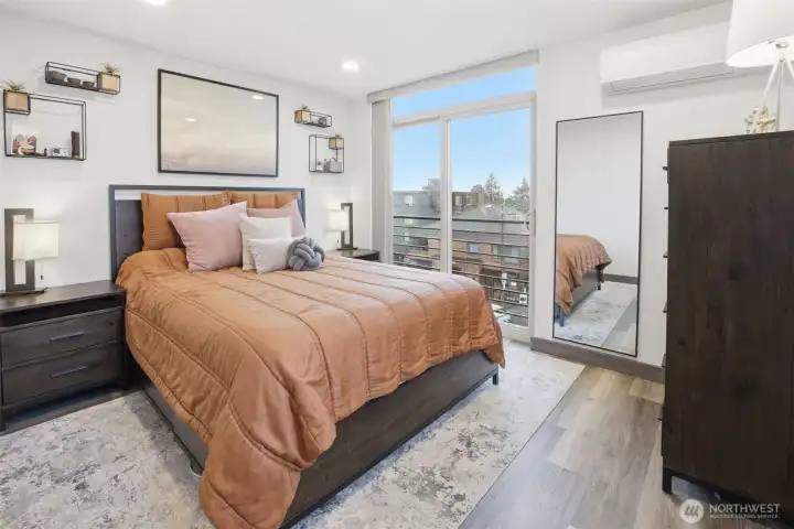 Primary retreat on upper level , Juliet balcony and mini-split for year-round comfort.