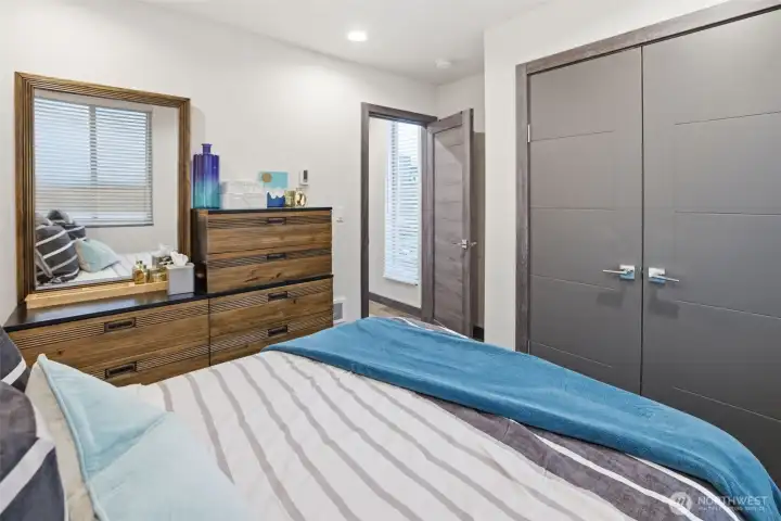 Comfortable secondary bedroom ideal for guests, home office, or flexible living.