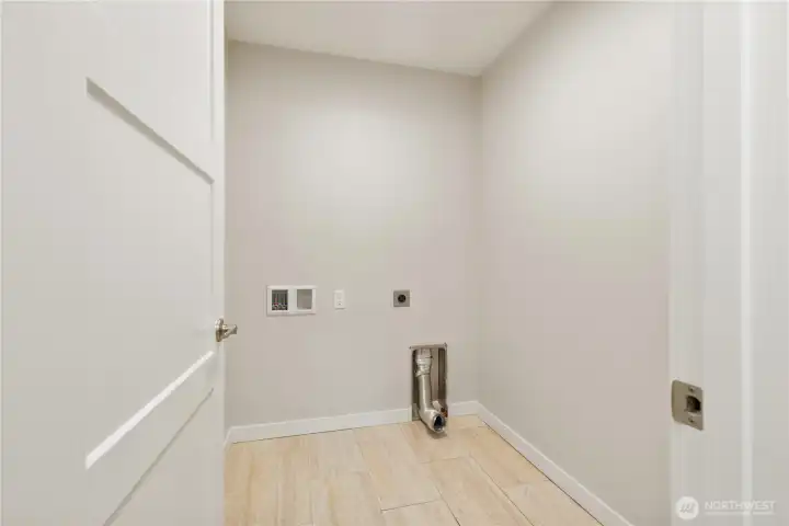 Separate laundry room.  Dryer hookup accommodates gas or electric version