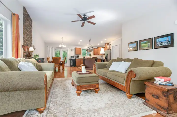 Spacious living room with vaulted ceiling.