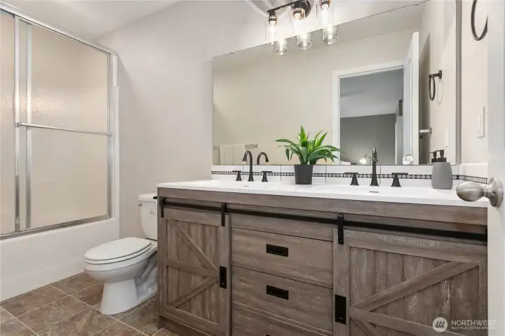 Primary bathroom with great cabinetry and double sinks