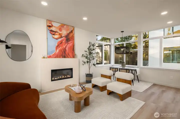 Living and dining spaces feel connected while being dilberated seperate