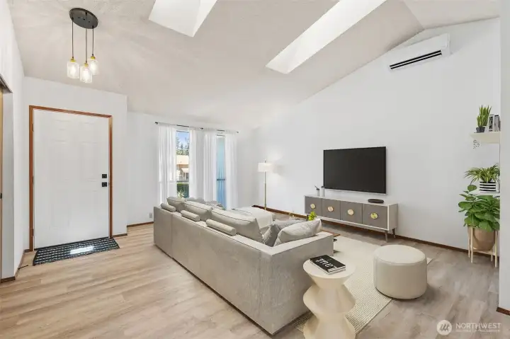 Step inside to bright natural light, soaring skylights, and a welcoming living space that instantly feels like home. (Virtually Staged)