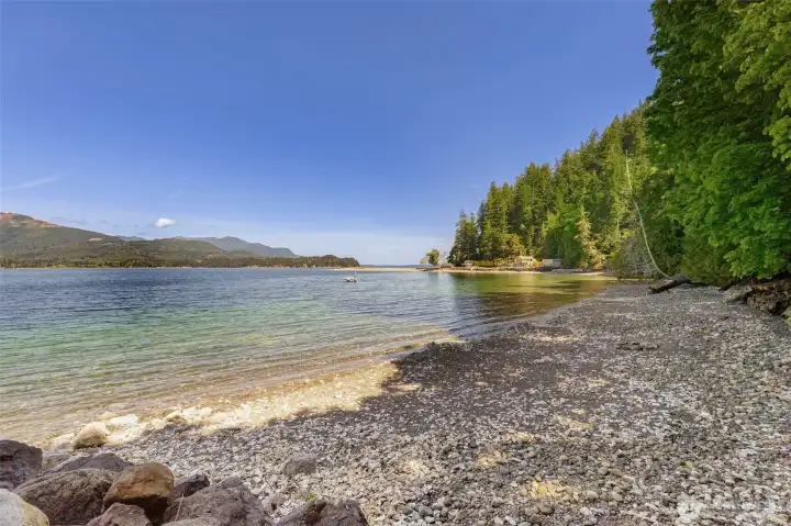 Private beach starts about where the log is