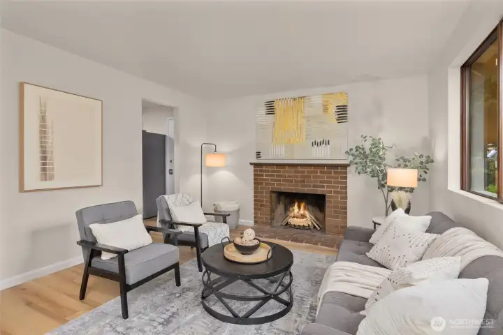Get cozy by the fireplace in the front living room. Get cozy by the fireplace in the front living room.