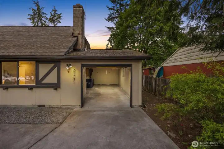 Spacious one car garage with built in work bench and cabinets. Spacious one car garage with built in work bench and cabinets.