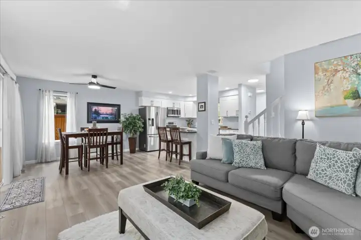 Light, bright living room. Plenty of space for gatherings, featuring large windows that invite natural sunlight and an open-concept layout ideal for hosting friends and family. Light, bright living room. Plenty of space for gatherings, featuring large windows that invite natural sunlight and an open-concept layout ideal for hosting friends and family.