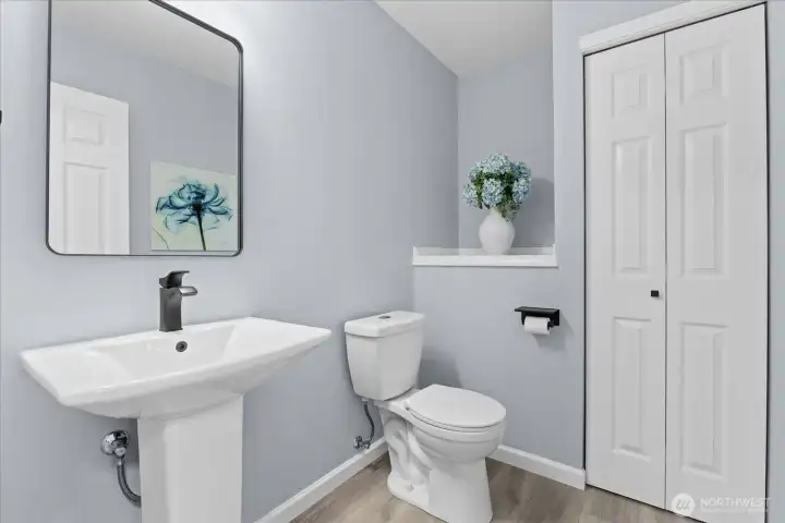 Fully remodeled half bathroom located on the main floor. Fully remodeled half bathroom located on the main floor.