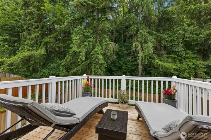 Entertain, relax, birdwatch, and more from your private cedar deck located just off the primary bedroom. Entertain, relax, birdwatch, and more from your private cedar deck located just off the primary bedroom.