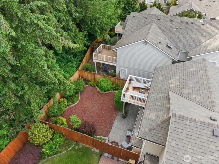 Drone image of this lovely backyard. Roof, fence, and decking are all newer Drone image of this lovely backyard. Roof, fence, and decking are all newer