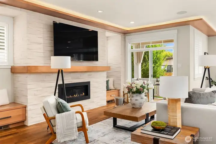 Designed for gathering, this light-filled great room flows effortlessly to a covered balcony—perfect for morning coffee, evening wine, and everything in between. Designed for gathering, this light-filled great room flows effortlessly to a covered balcony—perfect for morning coffee, evening wine, and everything in between.
