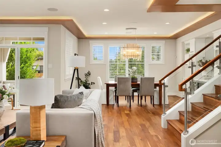 Designed for effortless entertaining, the dining room features custom built-ins, a dedicated wine fridge, and a striking designer chandelier—all seamlessly connected to the heart of the home. Designed for effortless entertaining, the dining room features custom built-ins, a dedicated wine fridge, and a striking designer chandelier—all seamlessly connected to the heart of the home.