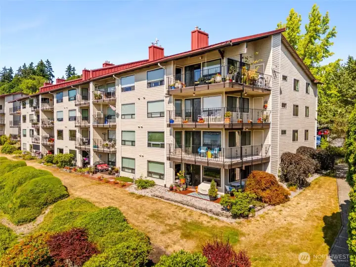 Another aerial view of the building...Unit A201 is the corner unit with wrap-around balcony-patio on the 2nd floor with no stairs. Another aerial view of the building...Unit A201 is the corner unit with wrap-around balcony-patio on the 2nd floor with no stairs.