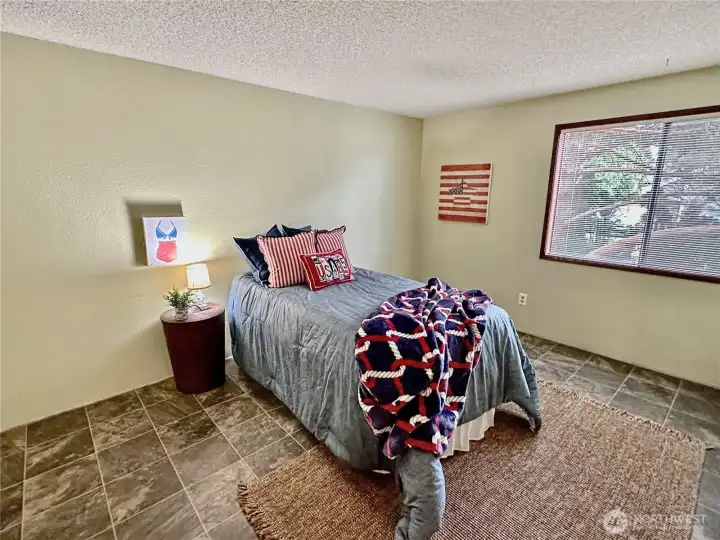 2nd bedroom with easy care vinyl flooring. 2nd bedroom with easy care vinyl flooring.